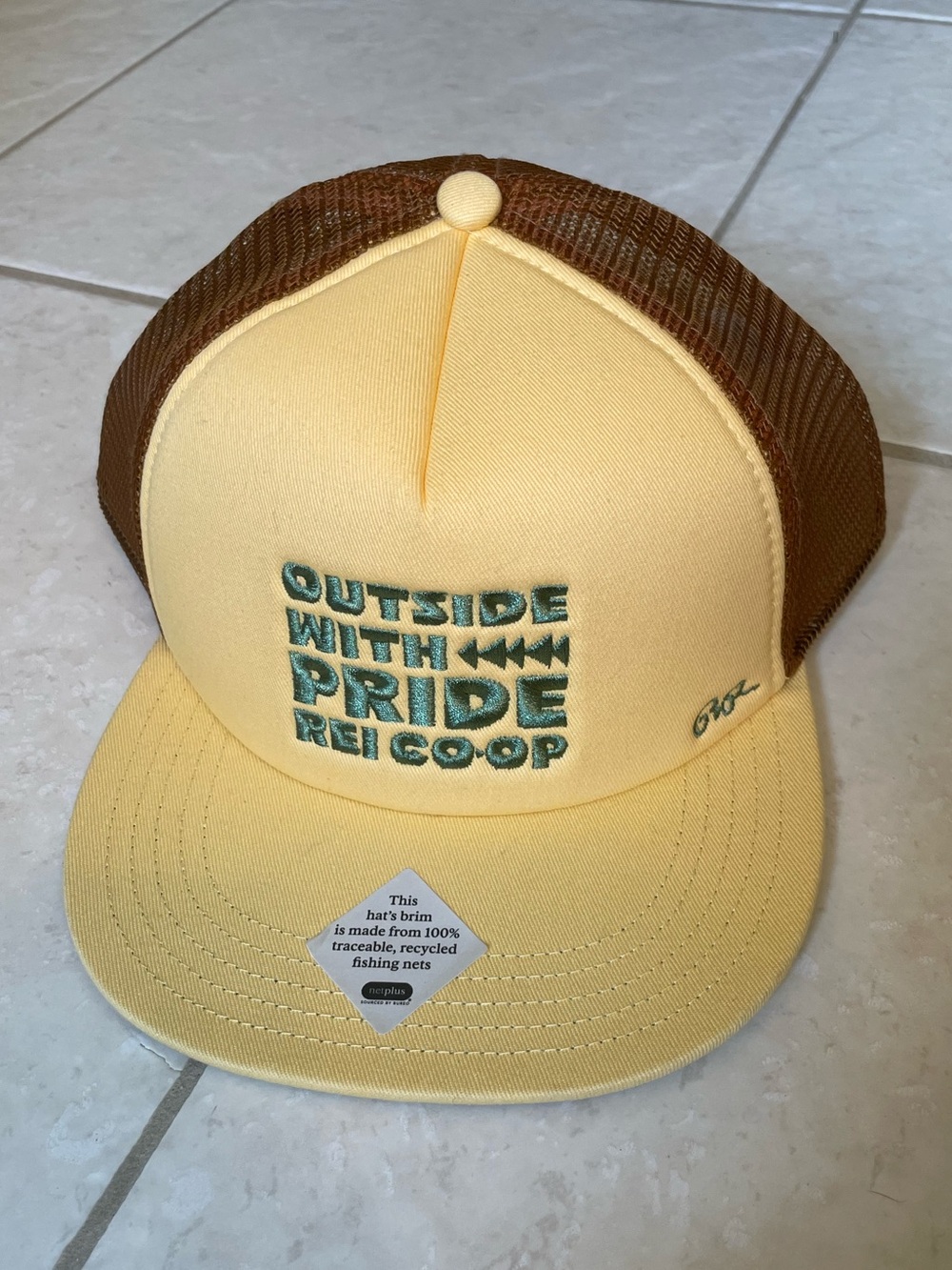 REI Yellow and Brown 'Outside With Pride' Trucker Hat